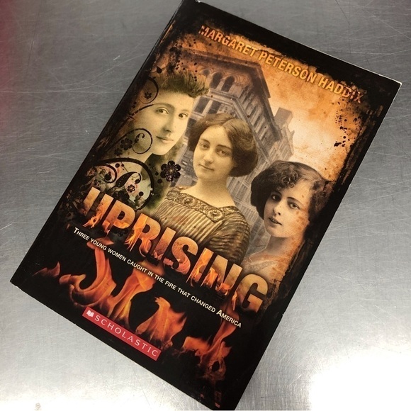 Uprising by: Margaret Paterson Haddix, paperback book - Picture 1 of 5
